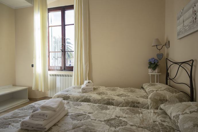 Imagen de la habitación del Hotel Affittacamere Lunamar. Foto 10