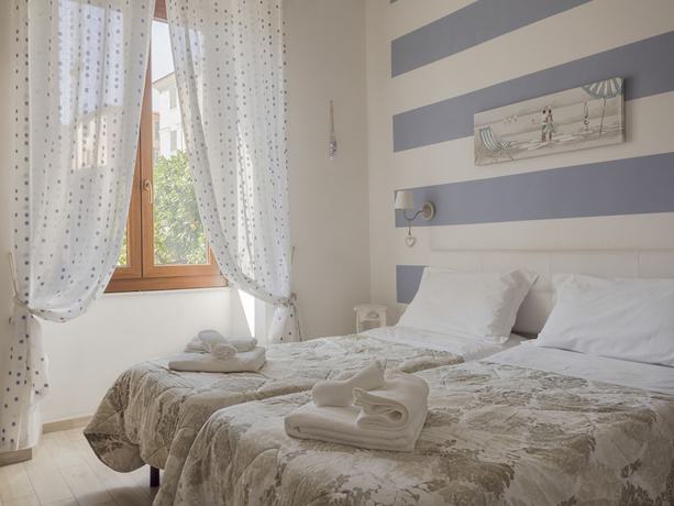 Imagen de la habitación del Hotel Affittacamere Lunamar. Foto 13