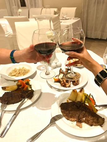 Imagen del bar/restaurante del Hotel Affordable Luxury Vacation. Foto 6