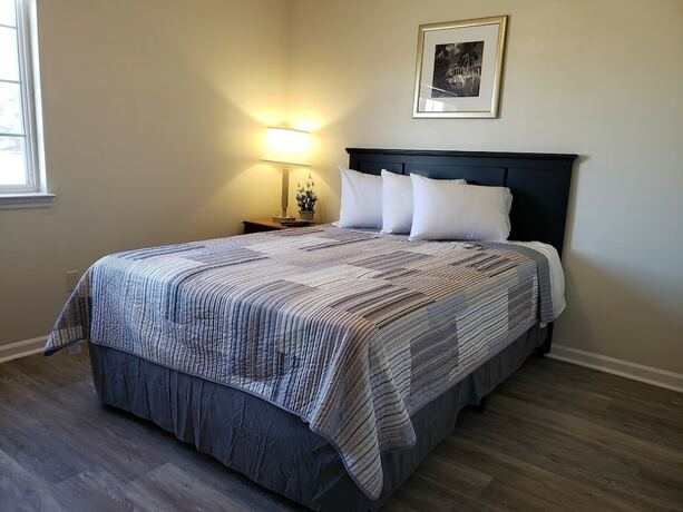 Imagen de la habitación del Hotel Affordable Suites Graham. Foto 18