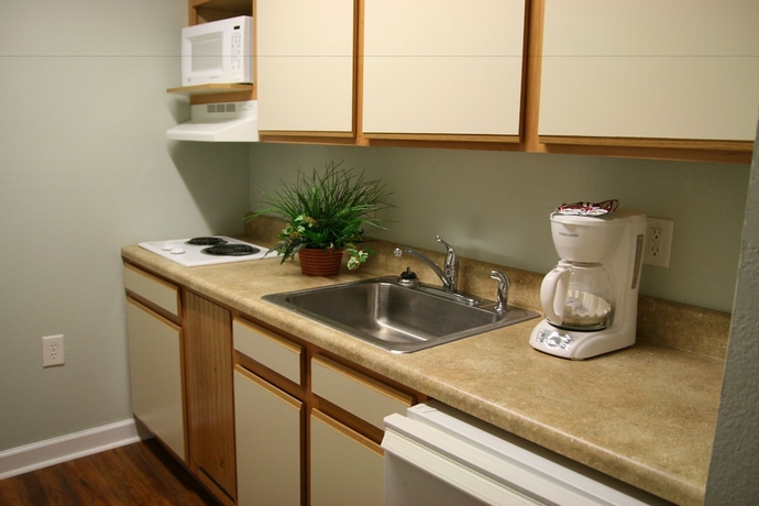 Imagen de la habitación del Hotel Affordable Suites Of America. Foto 13