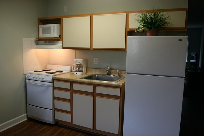 Imagen de la habitación del Hotel Affordable Suites Of America. Foto 14