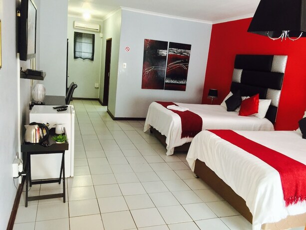 Imagen de la habitación del Hotel Africa Lodges. Foto 15