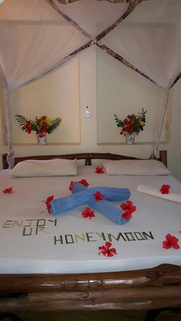 Imagen de la habitación del Hotel African Dream Cottages. Foto 8