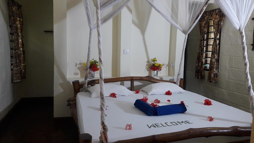 Imagen de la habitación del Hotel African Dream Cottages. Foto 9