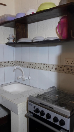 Imagen de la habitación del Hotel African Dream Cottages. Foto 13