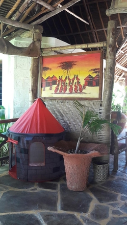 Imagen de la habitación del Hotel African Dream Cottages. Foto 17