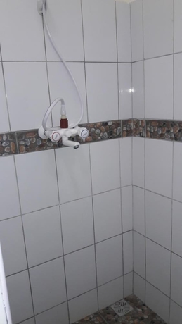 Imagen de la habitación del Hotel African Dream Cottages. Foto 18