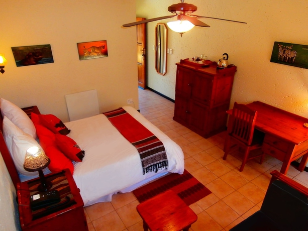 Imagen de la habitación del Hotel African Footprints Lodge. Foto 6