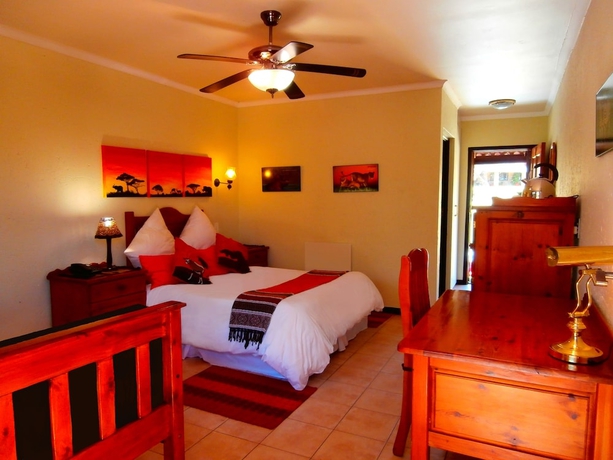Imagen de la habitación del Hotel African Footprints Lodge. Foto 7