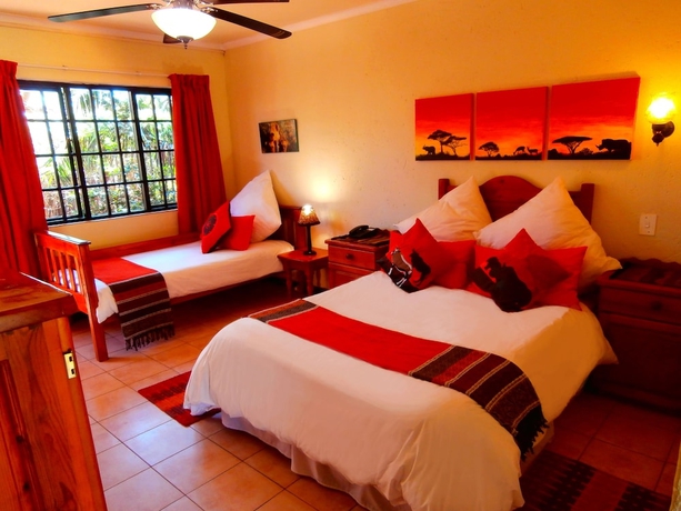 Imagen de la habitación del Hotel African Footprints Lodge. Foto 8