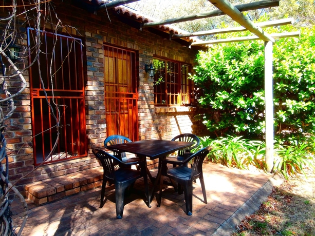 Imagen de la habitación del Hotel African Footprints Lodge. Foto 9