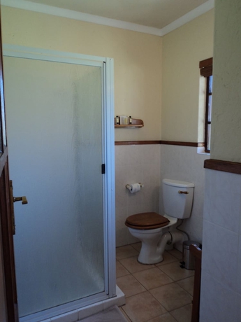 Imagen de la habitación del Hotel African Footprints Lodge. Foto 10