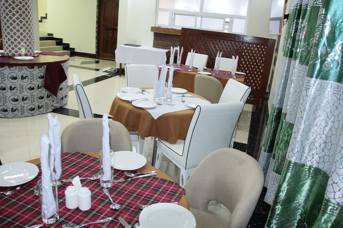 Imagen del bar/restaurante del Hotel Africana Grand Hotel Arusha. Foto 2