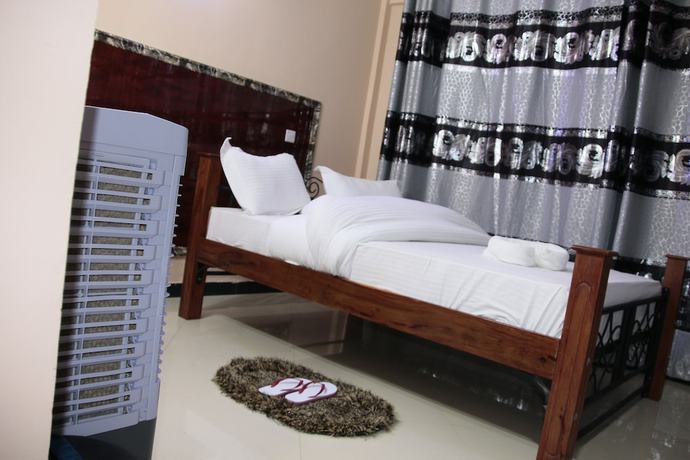 Imagen de la habitación del Hotel Africana Grand Hotel Arusha. Foto 7