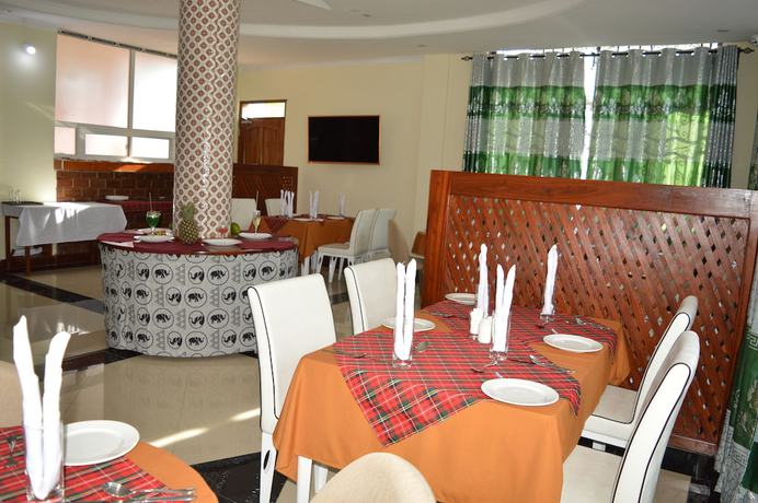 Imagen del bar/restaurante del Hotel Africana Grand Hotel Arusha. Foto 3