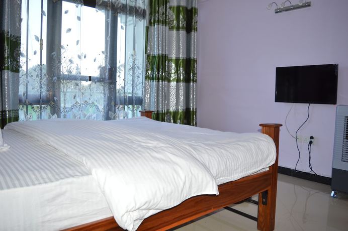 Imagen de la habitación del Hotel Africana Grand Hotel Arusha. Foto 16