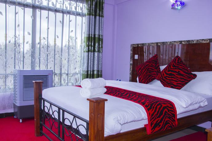 Imagen de la habitación del Hotel Africana Grand Hotel Arusha. Foto 18