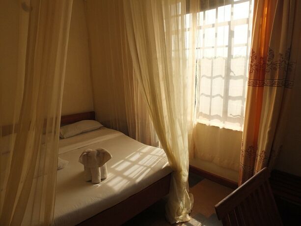 Imagen de la habitación del Hotel Afrika Lodges - Voi. Foto 19