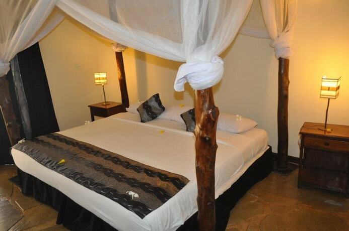 Imagen de la habitación del Hotel Afrika Pearl and Spa. Foto 13