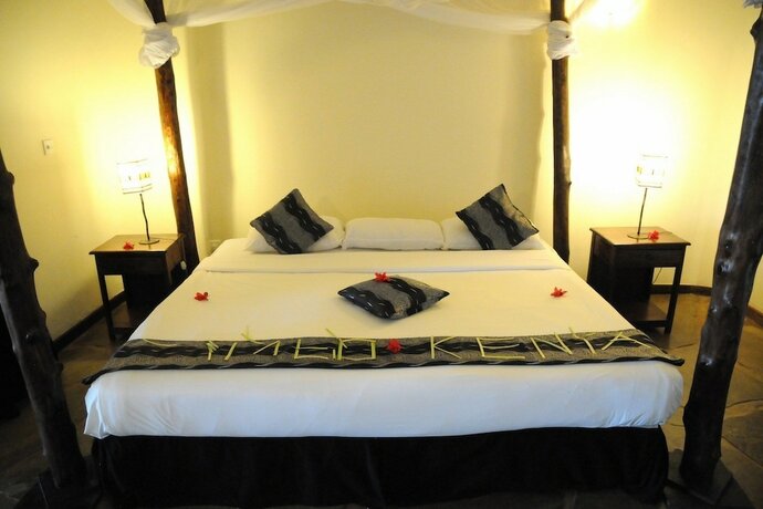 Imagen de la habitación del Hotel Afrika Pearl and Spa. Foto 15
