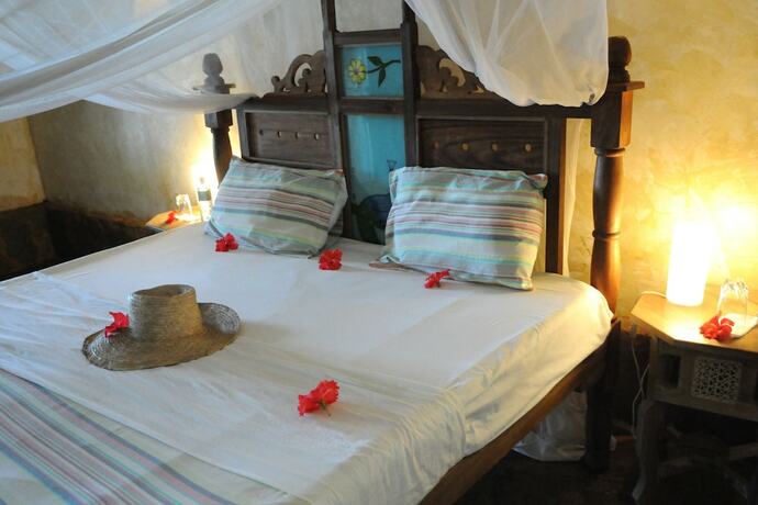 Imagen de la habitación del Hotel Afrika Pearl and Spa. Foto 16