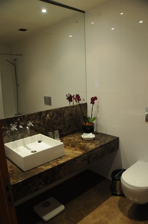 Imagen de la habitación del Hotel Afrin Prestige. Foto 3