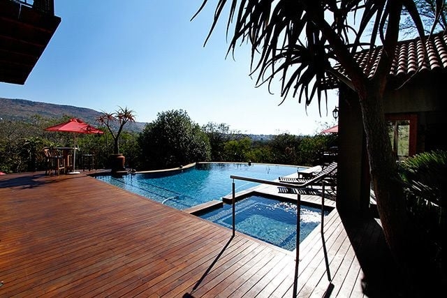 Imagen de la piscina del Hotel Afrique Boutique Ruimsig. Foto 18