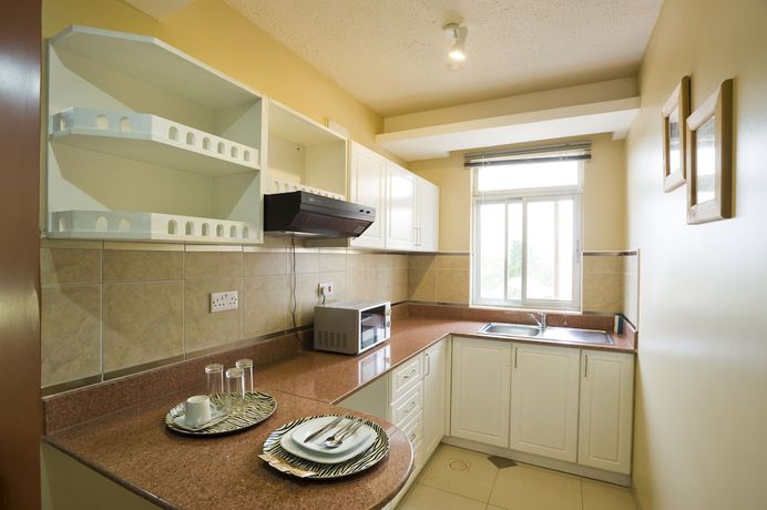 Imagen de la habitación del Hotel Afrique Suites. Foto 5