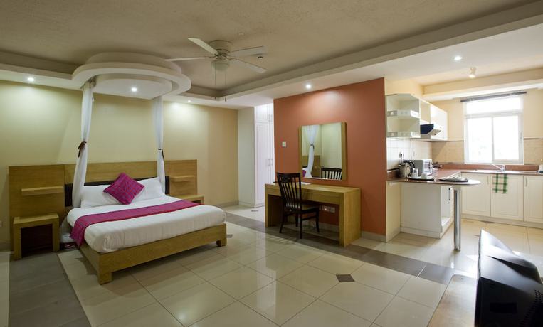 Imagen de la habitación del Hotel Afrique Suites. Foto 10