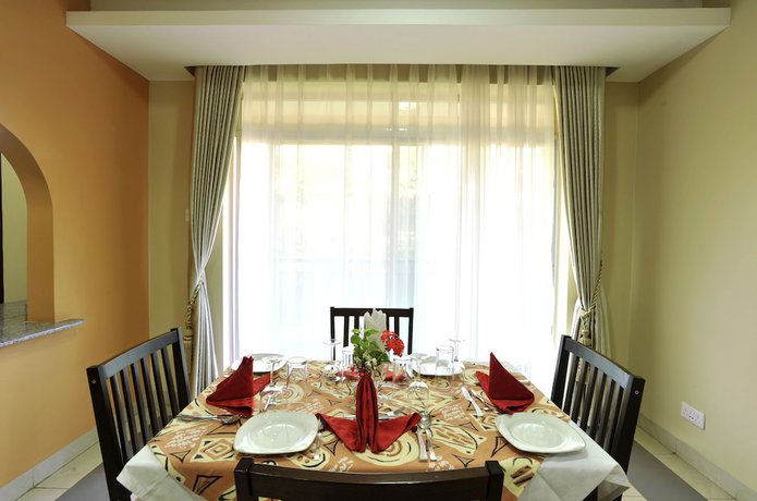 Imagen de la habitación del Hotel Afrique Suites. Foto 12