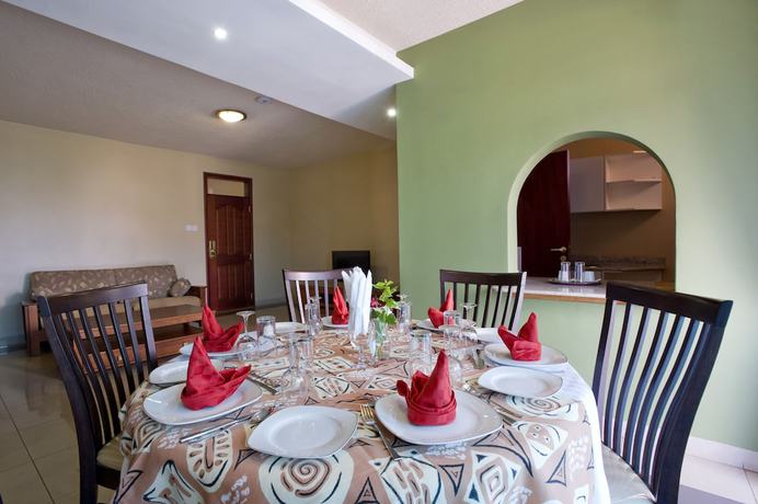 Imagen de la habitación del Hotel Afrique Suites. Foto 13