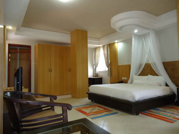 Imagen de la habitación del Hotel Afrique Suites. Foto 14
