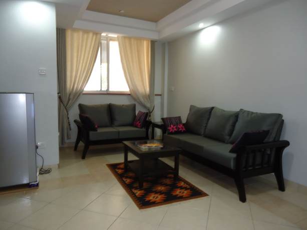 Imagen del bar/restaurante del Hotel Afrique Suites. Foto 2