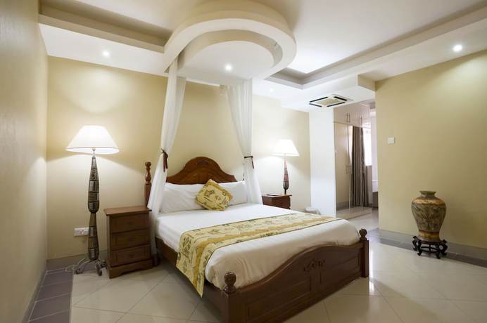 Imagen de la habitación del Hotel Afrique Suites. Foto 17