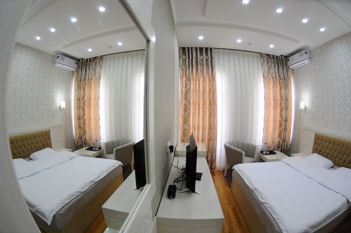 Imagen de la habitación del Hotel Afrosiyob. Foto 11