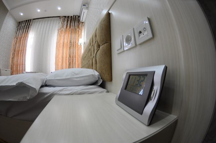 Imagen de la habitación del Hotel Afrosiyob. Foto 17