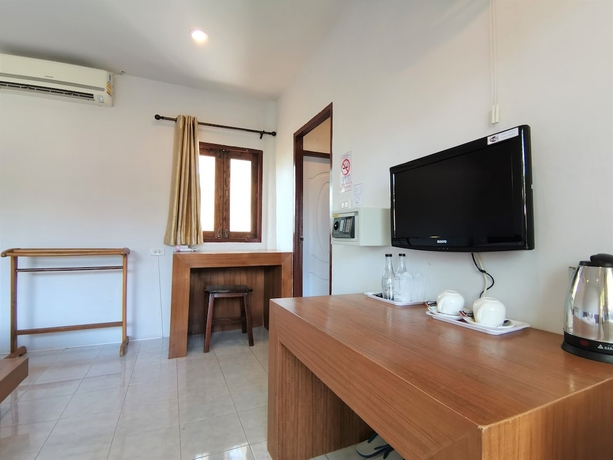 Imagen de la habitación del Hotel Again At Naiharn Beach. Foto 5
