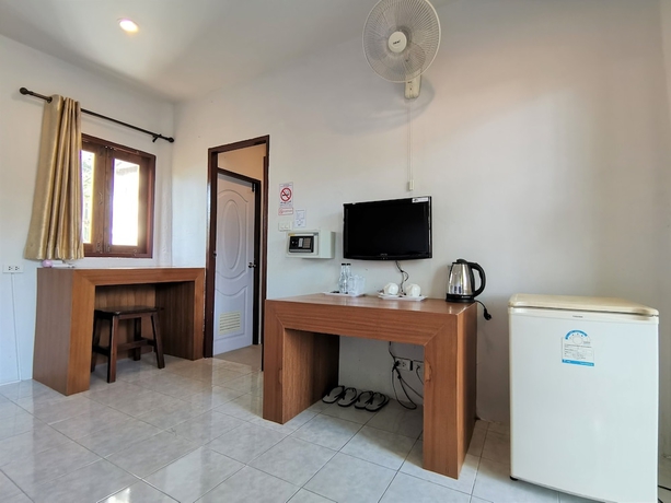 Imagen de la habitación del Hotel Again At Naiharn Beach. Foto 17