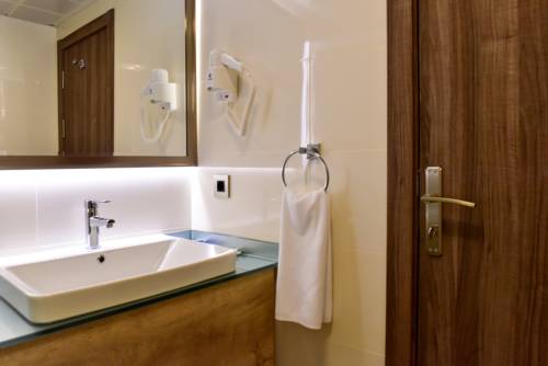 Imagen de la habitación del Hotel Agaoglu Otel. Foto 5