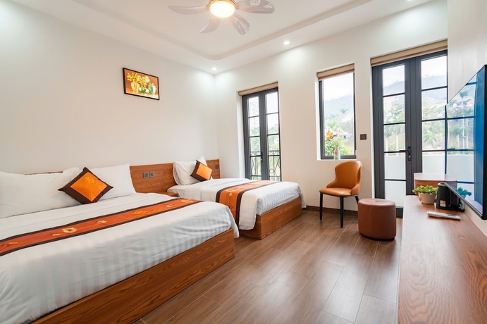 Imagen de la habitación del Hotel Agarwood. Foto 2