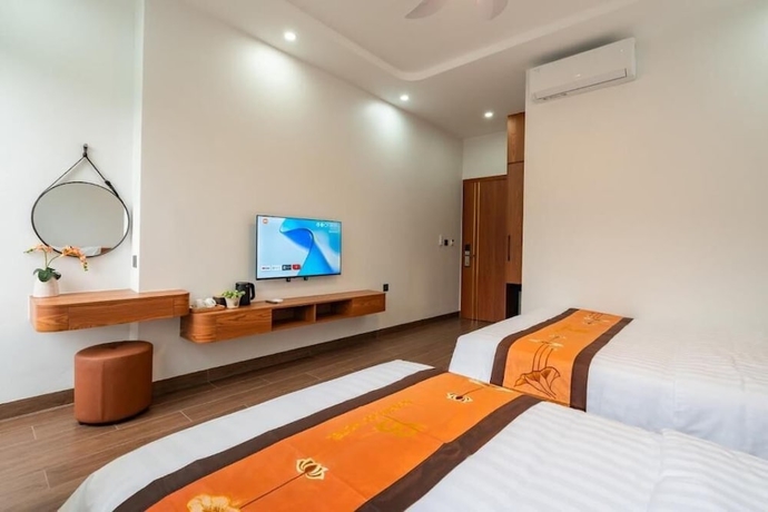 Imagen de la habitación del Hotel Agarwood. Foto 8