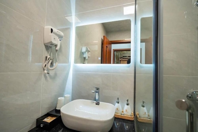 Imagen de la habitación del Hotel Agarwood. Foto 13