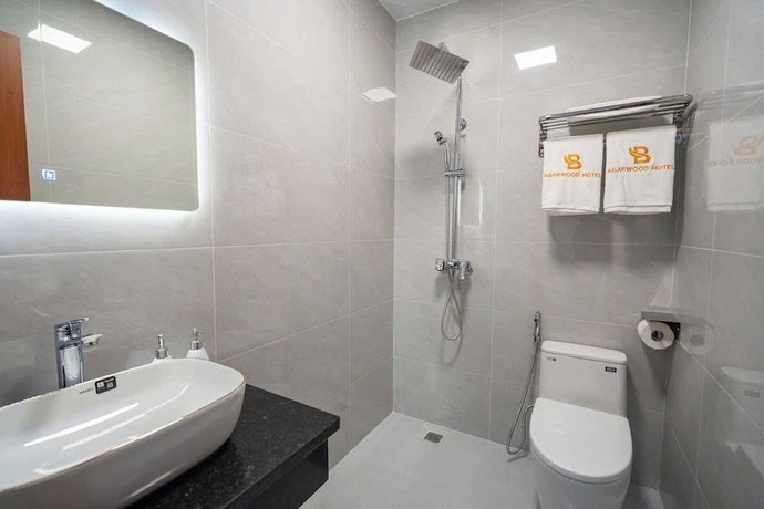 Imagen de la habitación del Hotel Agarwood. Foto 16