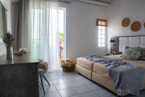 Imagen de la habitación del Hotel Aggello Boutique. Foto 7