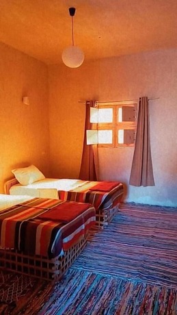 Imagen de la habitación del Hotel Aghurmi Siwa Ecolodge and Salt Cave. Foto 20