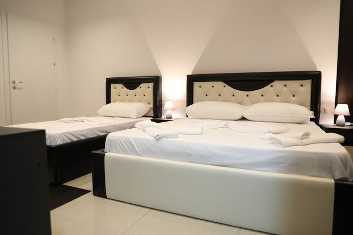 Imagen de la habitación del Hotel Aglon. Foto 16