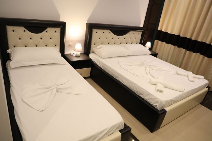 Imagen de la habitación del Hotel Aglon. Foto 17