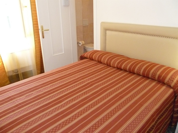 Imagen de la habitación del Hotel Agnello D'oro. Foto 3