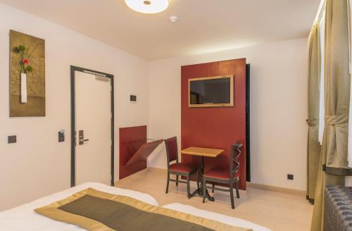 Imagen de la habitación del Hotel Agora Brussels Grand Place. Foto 7